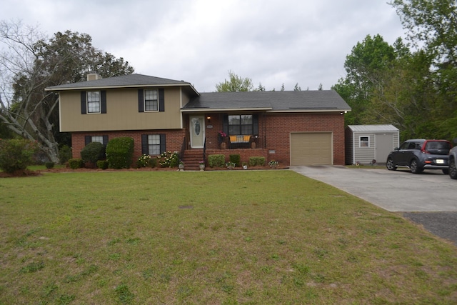 split level home with a front lawn, a shed, and a garage