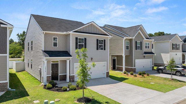 view of front facade featuring a front lawn and a garage