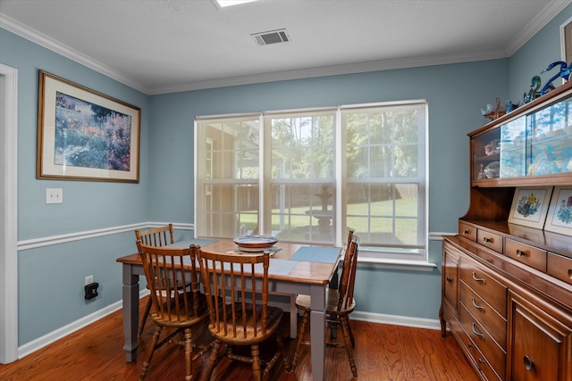 721 Spalding Ct, Martinez, GA 30907 - dining space with baseboards, wood finished floors, and ornamental molding