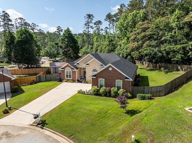 721 Spalding Ct, Martinez, GA 30907 - traditional home featuring brick siding, driveway, and roof with shingles