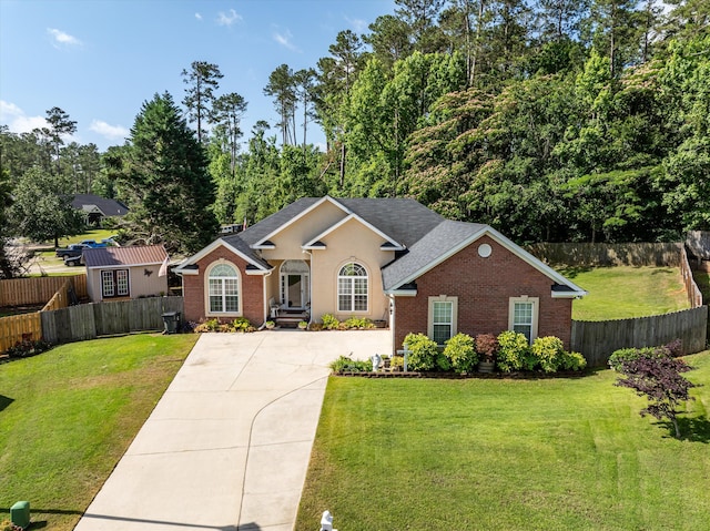 721 Spalding Ct, Martinez, GA 30907 - view of front of house with brick siding, concrete driveway, and a shingled roof