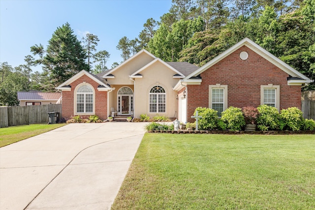 721 Spalding Ct, Martinez, GA 30907 - view of front facade with brick siding and driveway