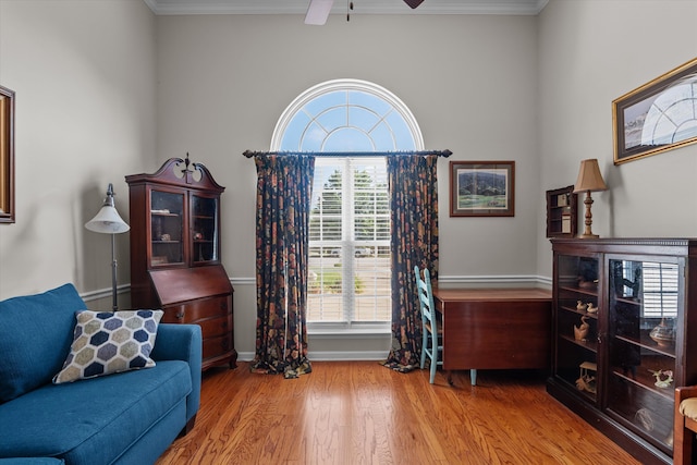 721 Spalding Ct, Martinez, GA 30907 - living area featuring crown molding, wood finished floors, baseboards, and a ceiling fan