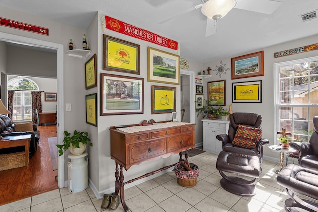 721 Spalding Ct, Martinez, GA 30907 - sitting room featuring light tile patterned flooring, a ceiling fan, and baseboards