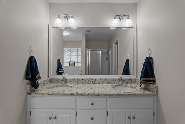 721 Spalding Ct, Martinez, GA 30907 - bathroom featuring a stall shower and double vanity