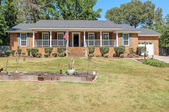 ranch-style home with covered porch, a garage, and a front lawn