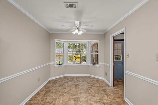 unfurnished room featuring ceiling fan and ornamental molding