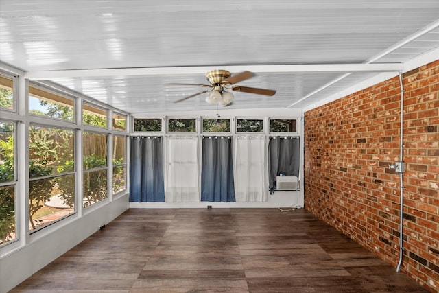 unfurnished sunroom featuring ceiling fan and cooling unit