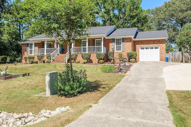 ranch-style home with a front lawn, a porch, and a garage