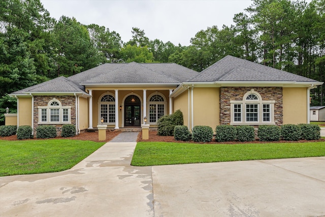 view of front of property with a front lawn and a porch