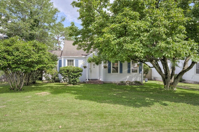 1730 Kissingbower Rd, Augusta, GA 30904 - view of property hidden behind natural elements featuring a front lawn and roof with shingles