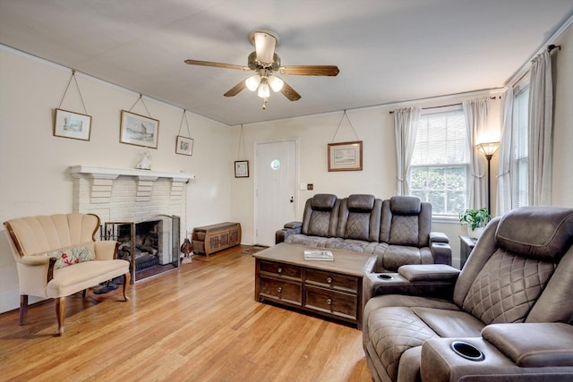 1730 Kissingbower Rd, Augusta, GA 30904 - living area featuring light wood-type flooring, ceiling fan, and a fireplace
