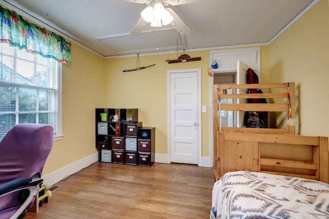 1730 Kissingbower Rd, Augusta, GA 30904 - bedroom featuring wood finished floors, ornamental molding, and attic access
