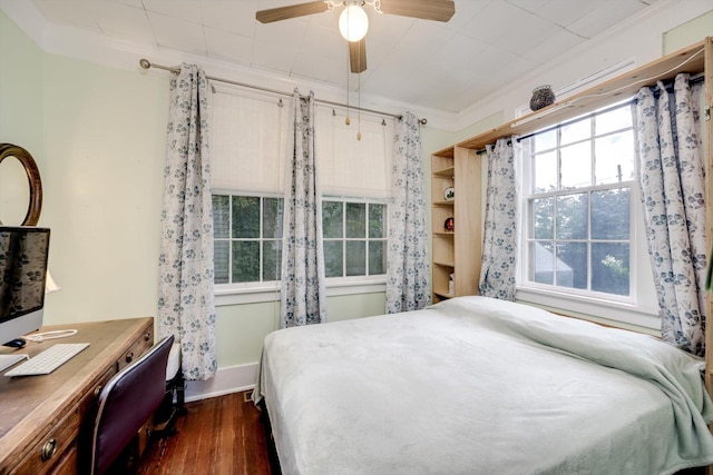 1730 Kissingbower Rd, Augusta, GA 30904 - bedroom featuring ornamental molding, dark wood-style flooring, a desk, and a ceiling fan