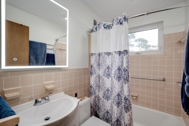 1730 Kissingbower Rd, Augusta, GA 30904 - full bathroom with shower / tub combo, tile walls, and vanity