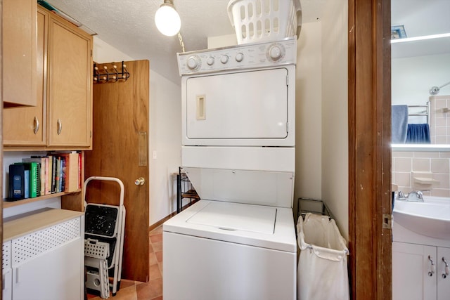 1730 Kissingbower Rd, Augusta, GA 30904 - washroom featuring stacked washer / drying machine and tile patterned floors