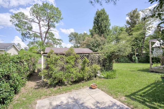 1730 Kissingbower Rd, Augusta, GA 30904 - view of grassy yard with a patio