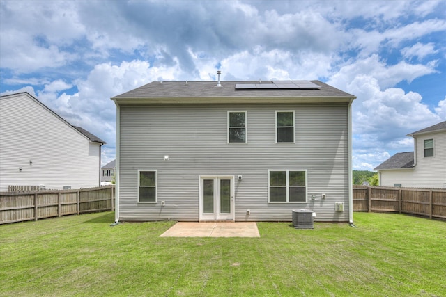 6093 Whitewater Dr, North Augusta, SC 29841 - back of house with solar panels, a patio, and a fenced backyard