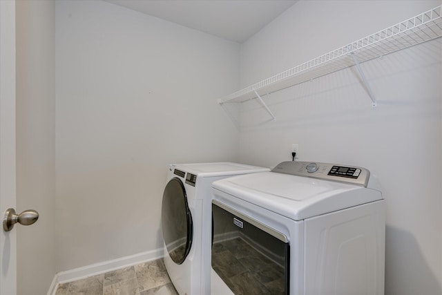 6093 Whitewater Dr, North Augusta, SC 29841 - washroom featuring washer and clothes dryer and baseboards
