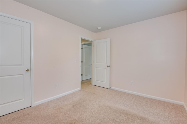6093 Whitewater Dr, North Augusta, SC 29841 - unfurnished bedroom featuring light colored carpet and baseboards