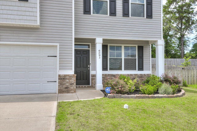 6093 Whitewater Dr, North Augusta, SC 29841 - view of exterior entry with a garage