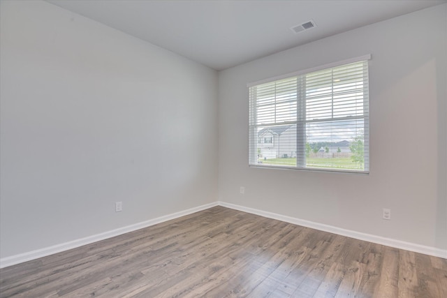 6093 Whitewater Dr, North Augusta, SC 29841 - spare room featuring baseboards and wood finished floors