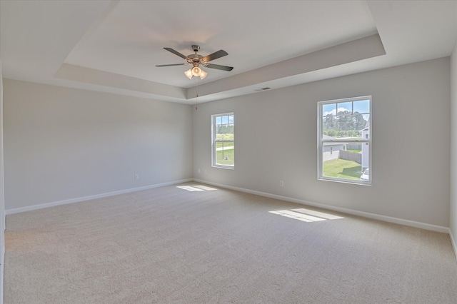 212 Quick Silver Ct, Graniteville, SC 29829 - spare room featuring a raised ceiling, carpet floors, and ceiling fan