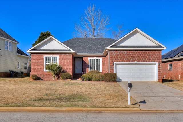 view of front of home featuring a garage and a front yard