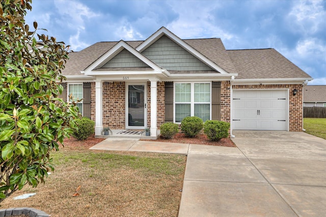 view of front of property with brick siding, roof with shingles, concrete driveway, and an attached garage