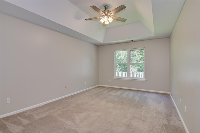 1869 Heathers Way, Augusta, GA 30906 - spare room with a raised ceiling, carpet floors, ceiling fan, and baseboards