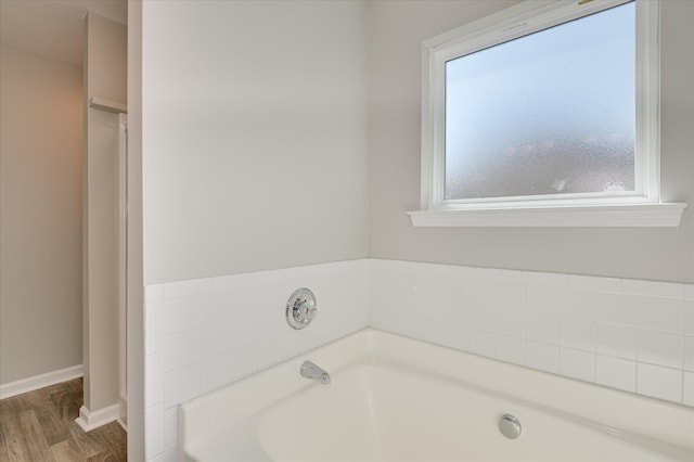 1869 Heathers Way, Augusta, GA 30906 - full bath featuring a bath, wood finished floors, and baseboards