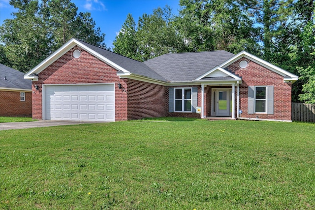 1869 Heathers Way, Augusta, GA 30906 - view of front facade with brick siding, a garage, driveway, and roof with shingles
