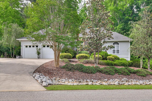 obstructed view of property featuring a garage