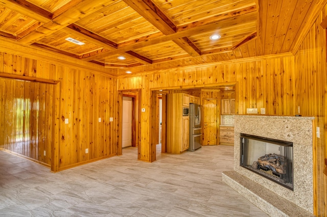 1423 Edgefield Rd, North Augusta, SC 29860 - unfurnished living room featuring a wood ceiling with exposed beams, wood walls, a fireplace, and coffered ceiling