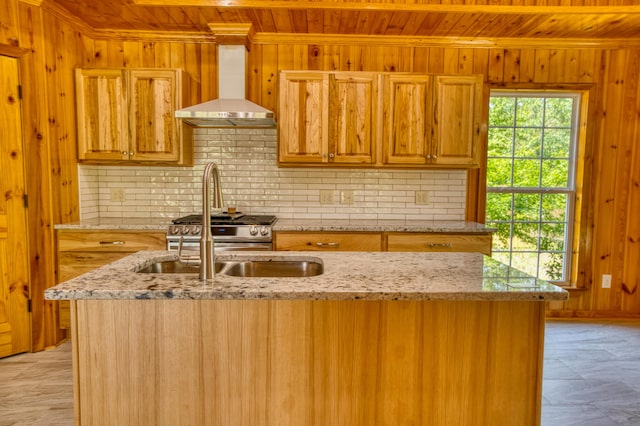 1423 Edgefield Rd, North Augusta, SC 29860 - kitchen with wall chimney range hood, wood ceiling, decorative backsplash, wood walls, and a center island with sink