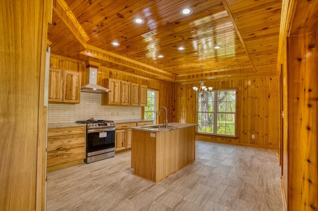 1423 Edgefield Rd, North Augusta, SC 29860 - kitchen featuring stainless steel gas stove, wood ceiling, wall chimney exhaust hood, a chandelier, and a center island with sink