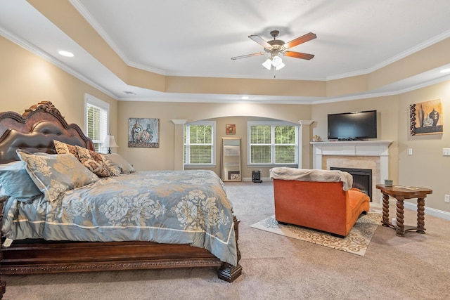 5726 Whispering Pines Way, Evans, GA 30809 - bedroom featuring carpet, crown molding, a tiled fireplace, a raised ceiling, and recessed lighting