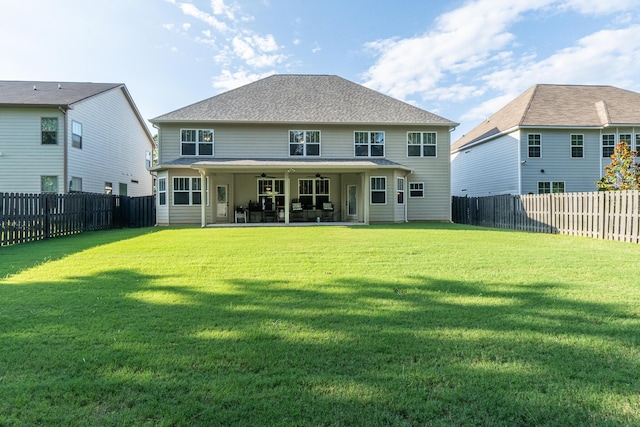 5726 Whispering Pines Way, Evans, GA 30809 - back of house with ceiling fan, a fenced backyard, and a patio area