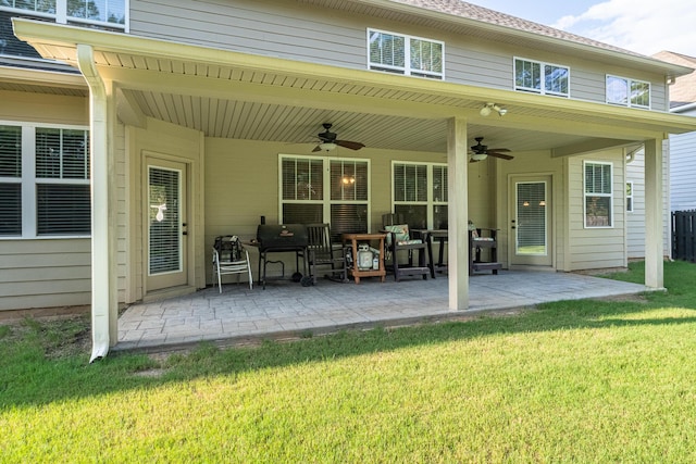 5726 Whispering Pines Way, Evans, GA 30809 - rear view of house featuring ceiling fan, a lawn, and a patio