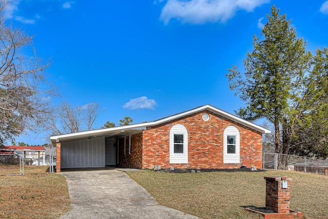 single story home with a front lawn and a carport