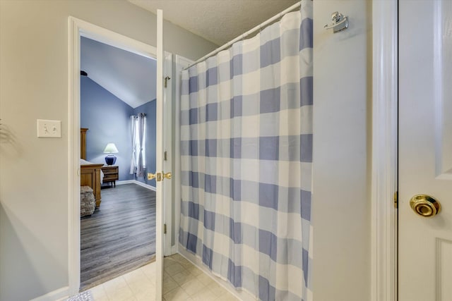 198 Eagle Lake Rd, North Augusta, SC 29841 - full bathroom with vaulted ceiling and a shower with curtain