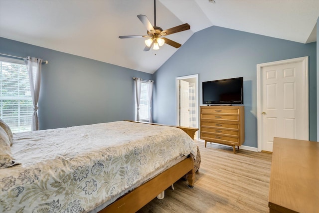 198 Eagle Lake Rd, North Augusta, SC 29841 - bedroom with light wood-style floors, vaulted ceiling, multiple windows, and a ceiling fan