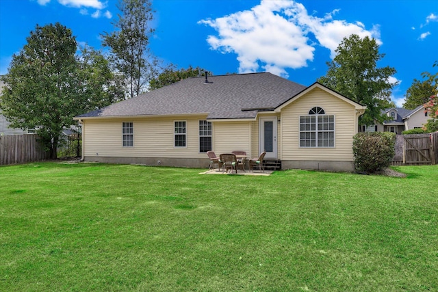 198 Eagle Lake Rd, North Augusta, SC 29841 - back of house featuring a fenced backyard, a patio area, entry steps, and roof with shingles