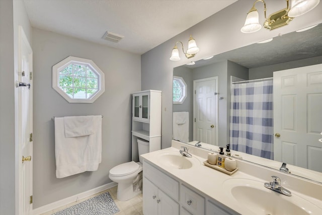 198 Eagle Lake Rd, North Augusta, SC 29841 - bathroom featuring double vanity, tile patterned flooring, and a shower with shower curtain