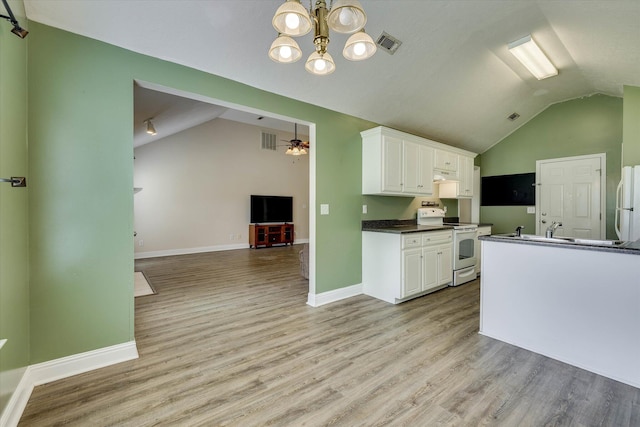 198 Eagle Lake Rd, North Augusta, SC 29841 - kitchen with white appliances, vaulted ceiling, dark countertops, white cabinets, and a chandelier