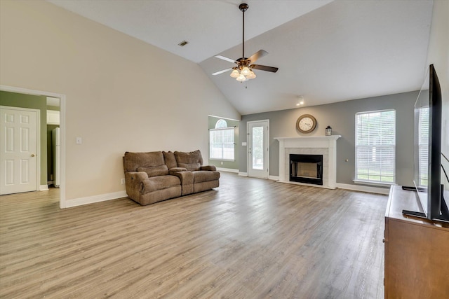 198 Eagle Lake Rd, North Augusta, SC 29841 - living room with high vaulted ceiling, a ceiling fan, light wood-type flooring, and a tile fireplace