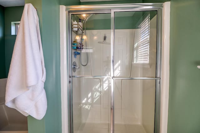 bathroom with an enclosed shower