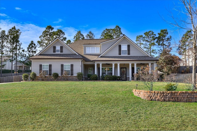 craftsman-style home with a front yard