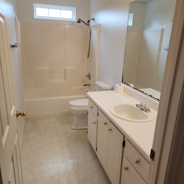 full bathroom with vanity, toilet, and  shower combination