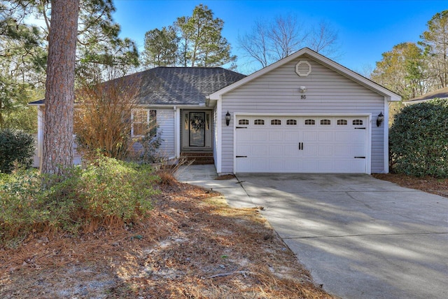 single story home featuring a garage